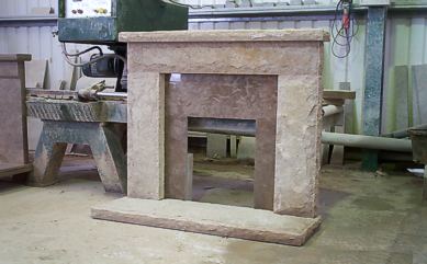 Natural face Purbeck Fireplace with polished "Cap" insert 